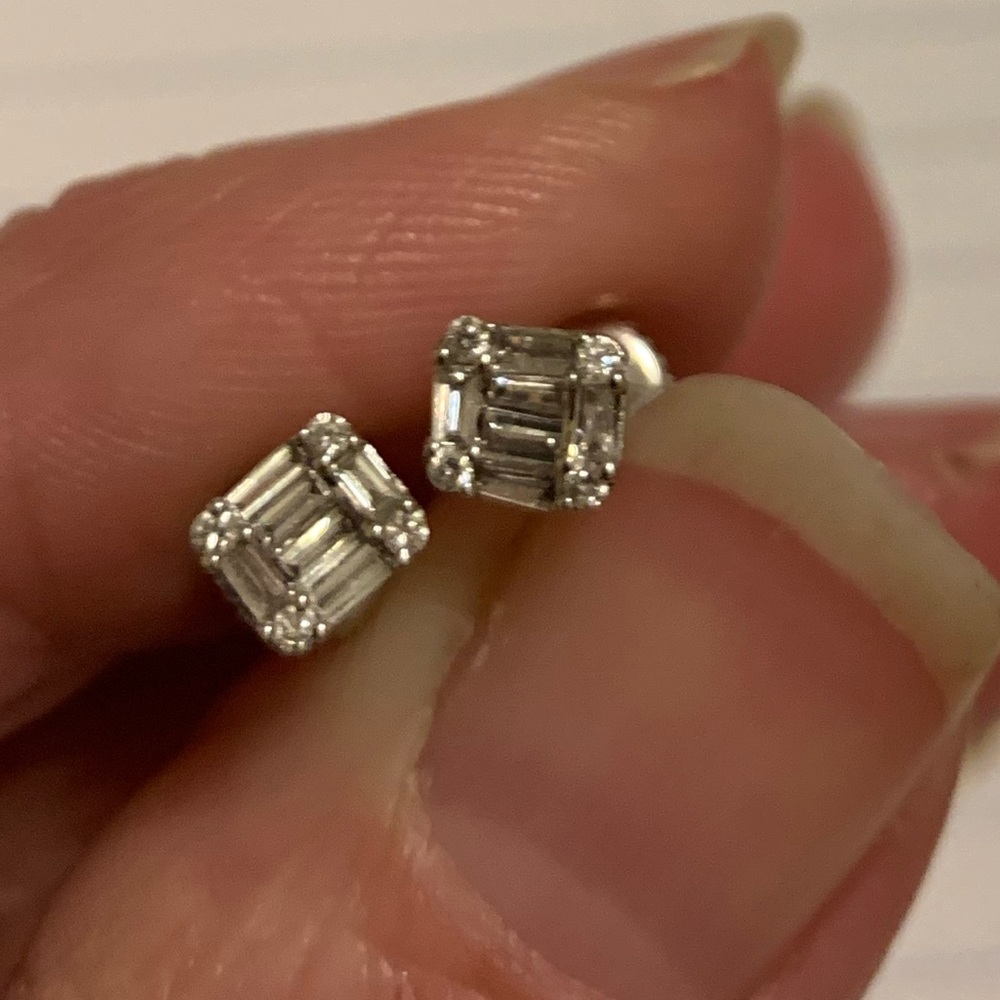 14K white gold diamond stud earrings with screw back posts.